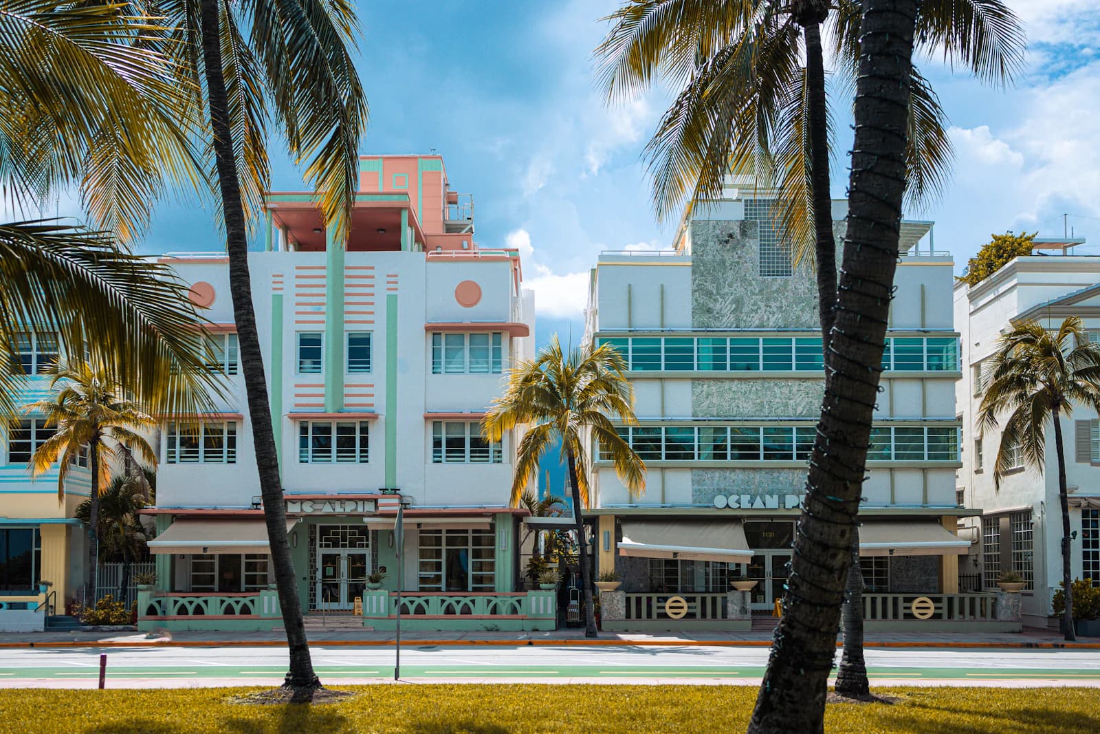 Art deco buildings among palm trees on Miami Beach